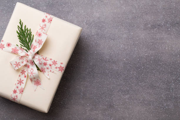 istock Christmas presents with ribbon on grey  background. 862358604