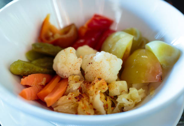 A variety of pickled vegetables in a bowl as side dish