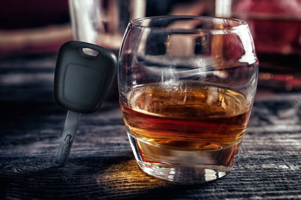 istock Glass of whiskey and car keys 862359582