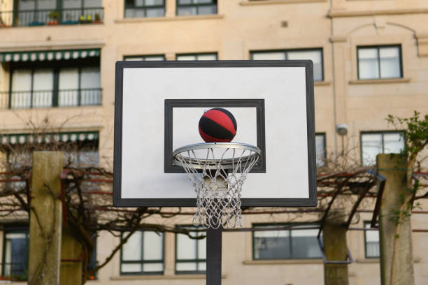 istock ball flying into the basketball net 862359888