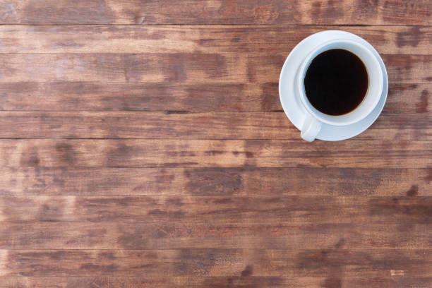 istock Off center coffee cup and saucer with copy space 862360058