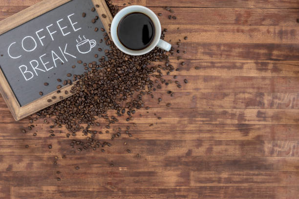 Still life of coffee and sign with copy space