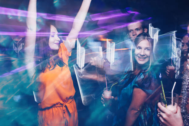 istock Happy friends dance party in motion 862366138