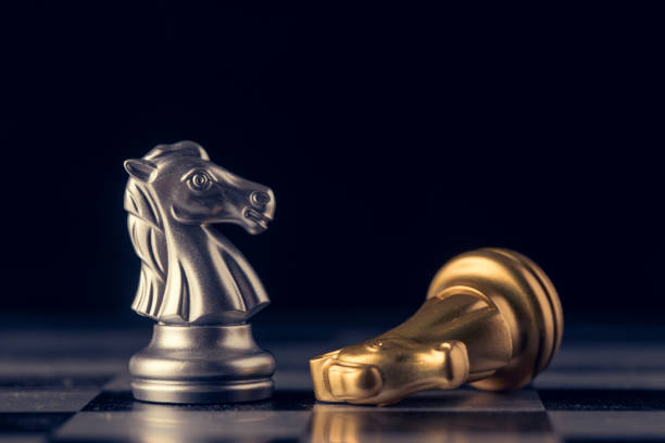 istock Chess on a chessboard at black background, Business leader concept. vintage tone. 862371248