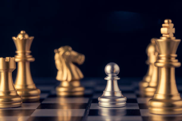 istock Chess on a chessboard at black background, Business leader concept. vintage tone. 862371268