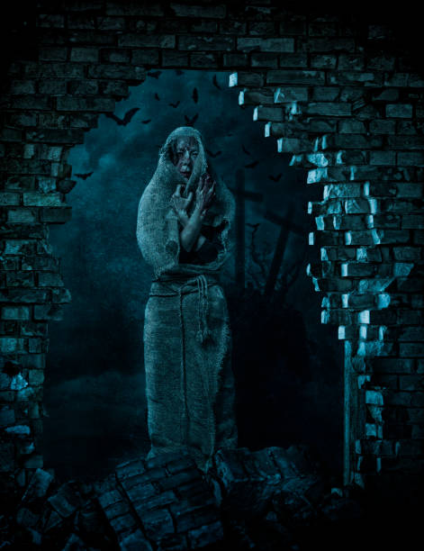 istock Vampire woman in old cemetery 862376472