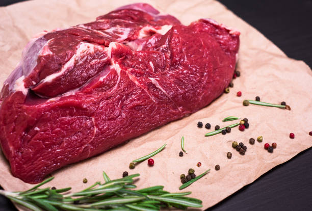 istock fresh piece of beef on brown kraft paper 862378342