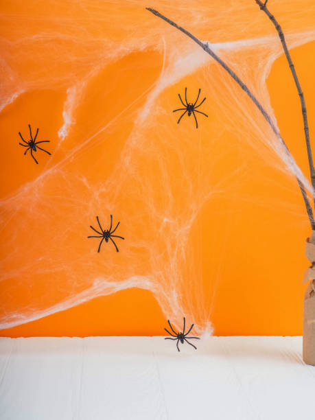 istock bat Halloween orange bright Vaughn, copy space, cute, humorous backdrop for a fun filled holiday, flat lay, black spiders and pumpkin. 862378868