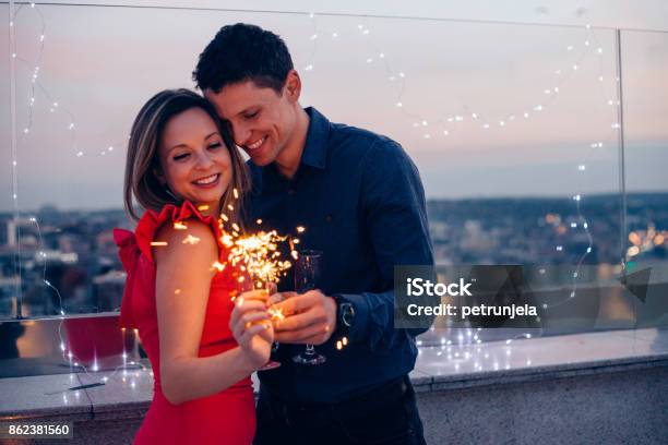 Love Is In The Air Stock Photo - Download Image Now - New Year, Couple - Relationship, Celebration