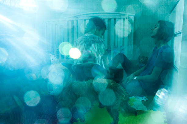 Mother and child in the baby's room, learning to read