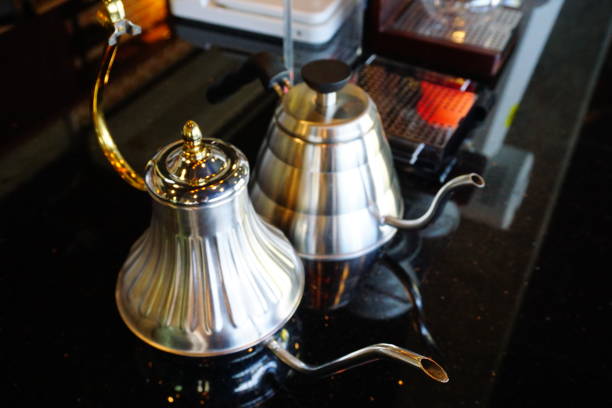 istock pouring hot water in frech press coffee maker 862385076