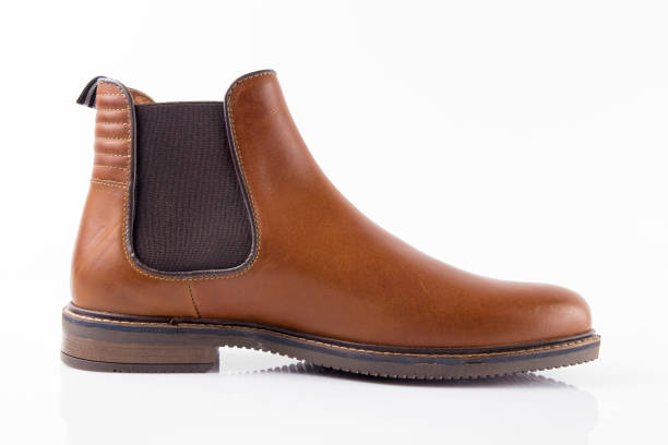 istock Male brown leather elegant boot on white background 862386400
