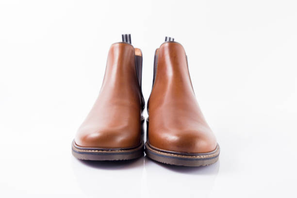 istock Male brown leather elegant boot on white background 862386578