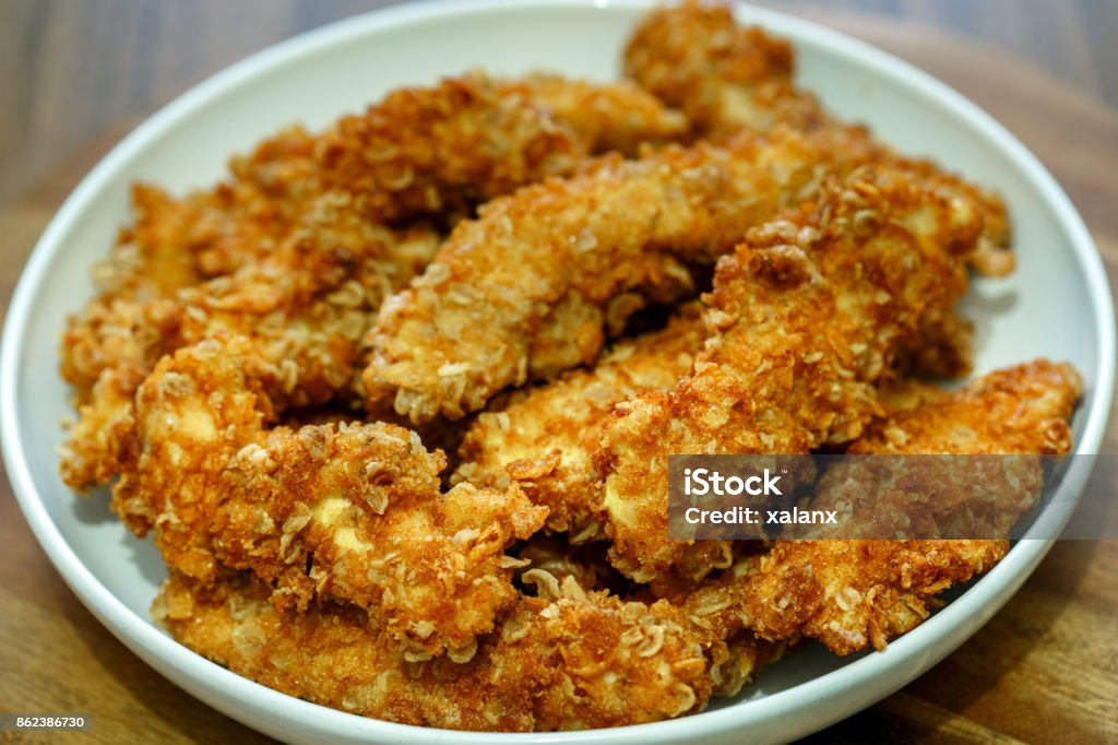 Chicken breast strips croquettes Crunchy chicken breast strips croquettes covered in cereals Breakfast Cereal Stock Photo