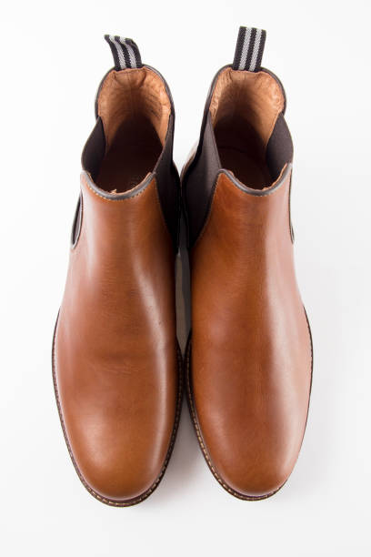 istock Male brown leather elegant boot on white background 862395652