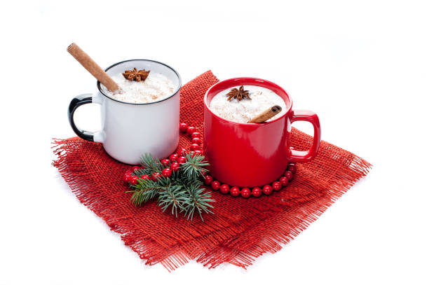 istock eggnog cocktail in mugs arranged with christmas decoration isolated on white background 862398292