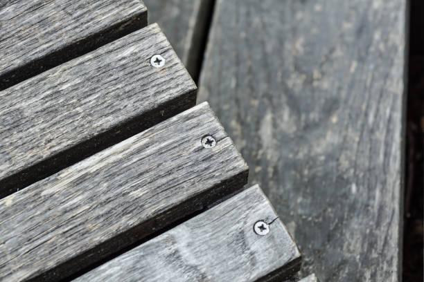 istock A row of stylish deck chairs . wooden board 862403976