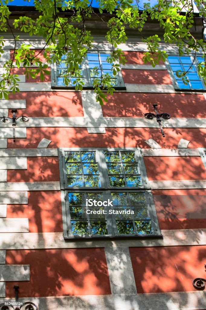 Otradzhenie in the windows of the old house Otradzhenie in the windows of the old house. Sweden. Stockholm Apartment Stock Photo