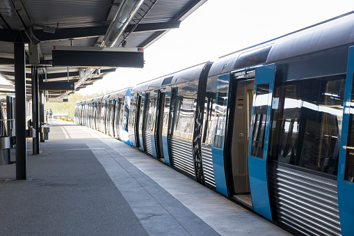 Swedish subway station with a train standing at the platform