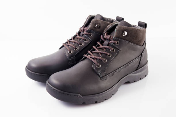istock Male black leather boot on white background 862407668