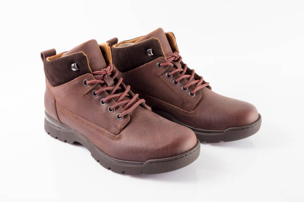 istock Male brown leather boot on white background 862408754