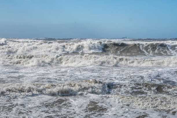 istock Stormy sea huge waves breaking near the coast 862415880