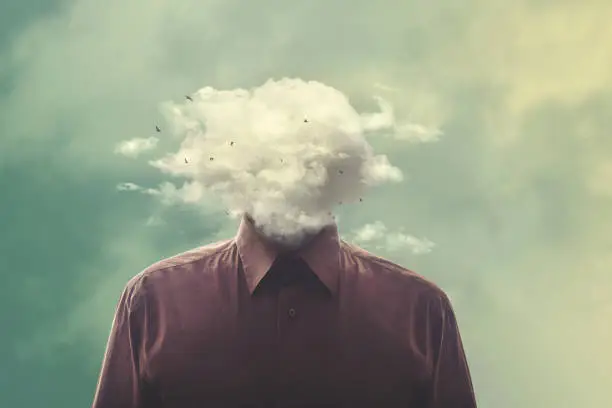 Photo of stressed man head in the cloud