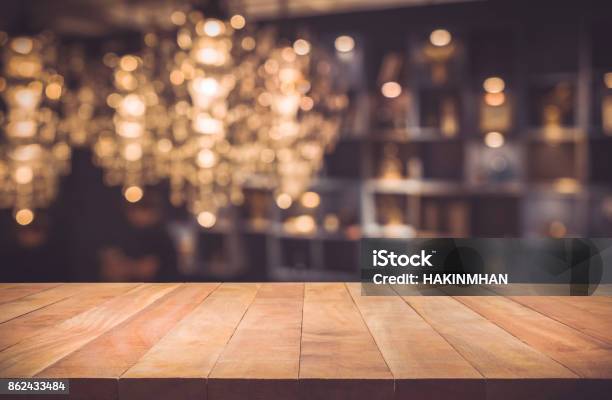 Wood Table On Blur Cafe Background Stock Photo - Download Image Now - Dining Table, Christmas, Backgrounds