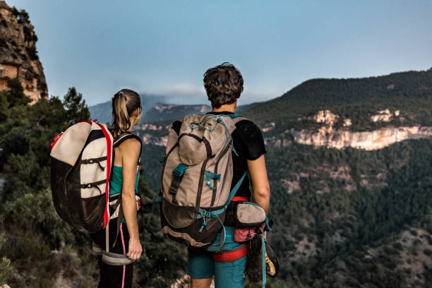istock Young rock climbers looking at the mountains 862433900