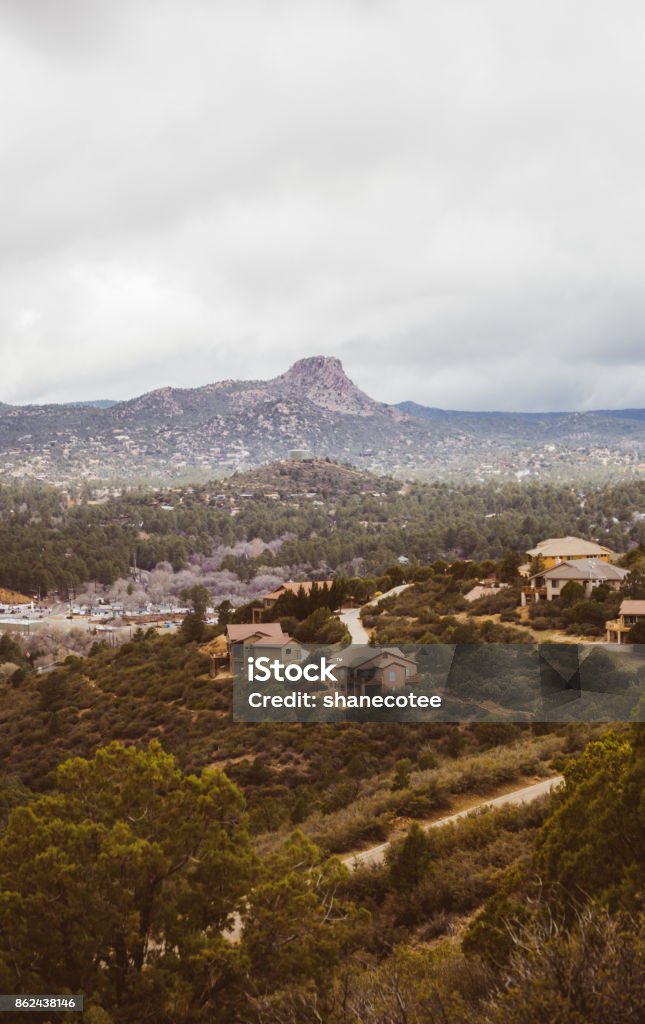 Thumb Butte and Homes Thumb Butte and residential homes in Prescott, Arizona, USA. Arizona Stock Photo