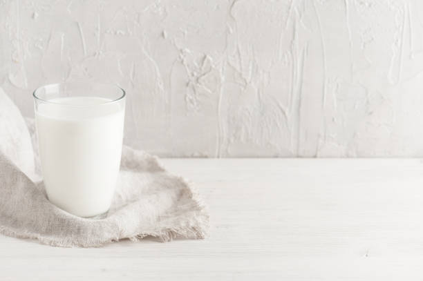istock Background with glass with milk 862439318