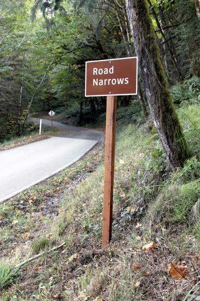 istock Road Narrow Sign On A Backroad 862446788
