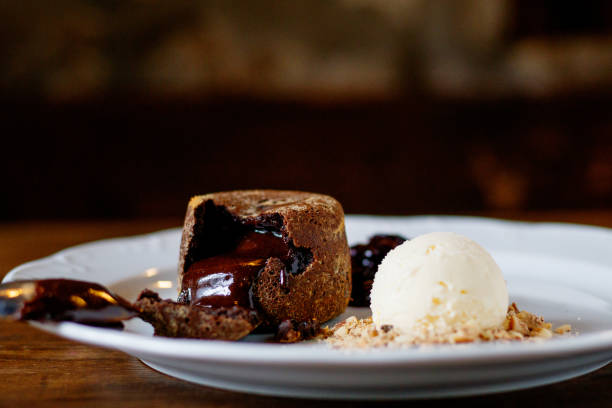 istock Fondan with syrup and ice-cream on a plate 862446926