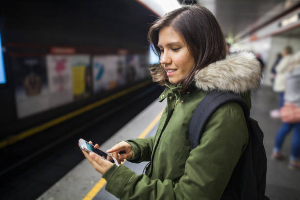 istock Young woman waiting for her train 862450396