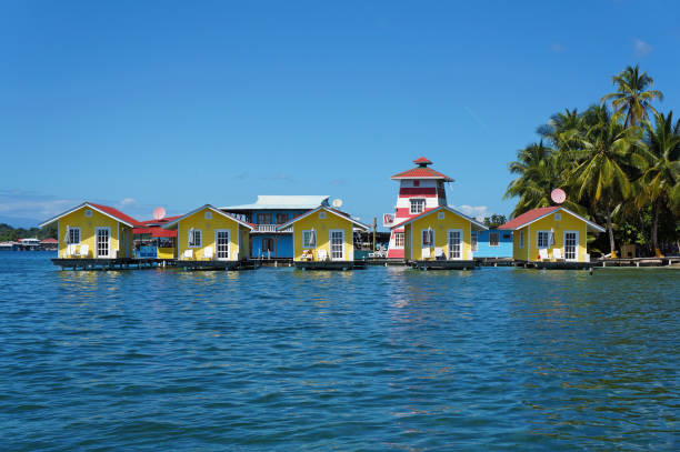 tropical vacation bungalows over water - bocas del toro imagens e fotografias de stock