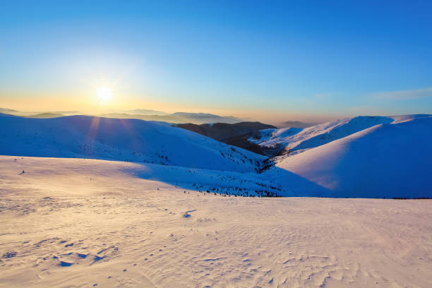istock Mountain peaks covered with snow and ice, on which falls blue shadow, against the blue sky. Frosty day, gorgeous wintry scene. Location place Carpathian national park, Ukraine, Europe. 862454008