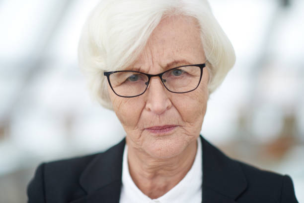 istock Sullen senior businesswoman 862457302