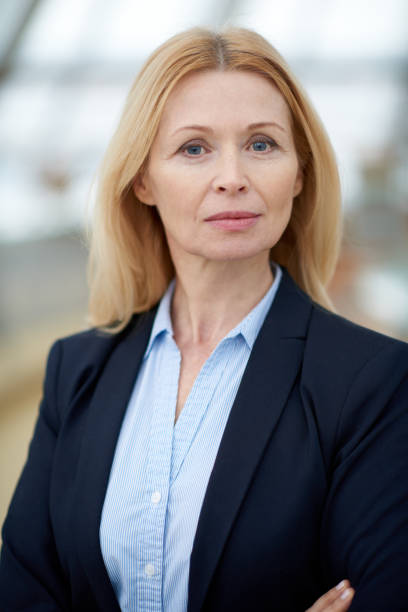 Responsible female candidate Portrait of serious attractive mature female politician wearing formal jacket and thinking of success politician photos stock pictures, royalty-free photos & images