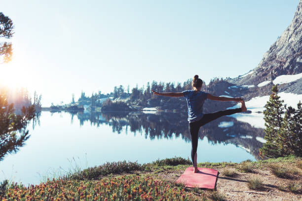 istock young girl practicing yoga in wild 862461668