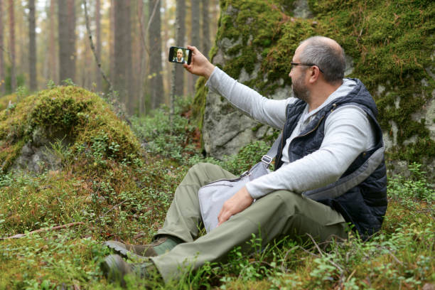 istock Mature Adult man with a smartphone ( selfie) 862468344