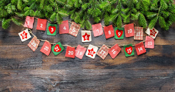 istock Advent calendar Christmas tree branches wooden background 862473150