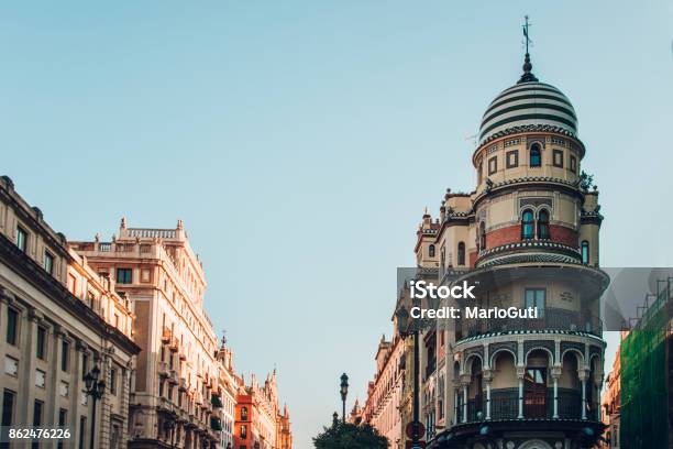 Avenida De La Constitucion Seville Spain Stock Photo - Download Image Now - Architectural Dome, Architecture, Avenue