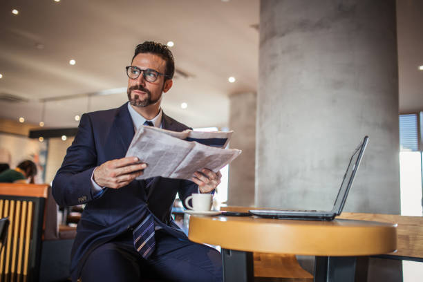 istock Gentleman reading today news 862476302