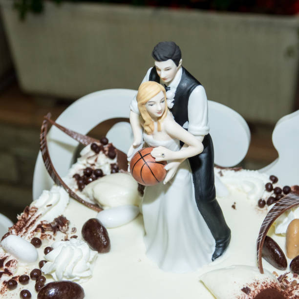 Bride and groom, cake with basketball
