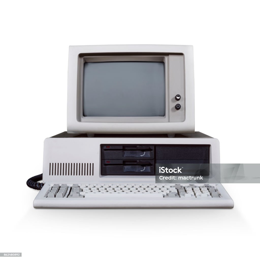 Retro DOS computer An old DOS desktop PC isolated on white Computer Stock Photo