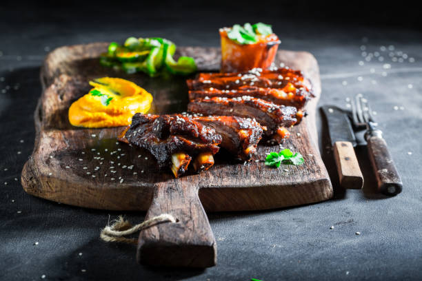 istock Delicious roasted ribs with vegetables and potato 862488254