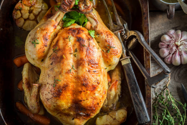istock Tasty roasted chicken with thyme and garlic 862492206