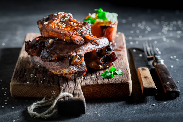 istock Spicy roasted ribs with potato and sesame 862494546
