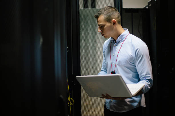 IT technician in server room Server room IT programer. Shallow DOF. Developed from RAW; retouched with special care and attention; Small amount of grain added for best final impression. 16 bit Adobe RGB color profile.Quality control inspection in the factory. Shallow DOF. Developed from RAW; retouched with special care and attention; Small amount of grain added for best final impression. 16 bit Adobe RGB color profile.Quality control inspection in the factory. Shallow DOF. Developed from RAW; retouched with special care and attention; Small amount of grain added for best final impression. 16 bit Adobe RGB color profile.Quality control inspection in the factory. Shallow DOF. Developed from RAW; retouched with special care and attention; Small amount of grain added for best final impression. 16 bit Adobe RGB color profile.IT technician in server room. Shallow DOF. Developed from RAW; retouched with special care and attention; Small amount of grain added for best final impression. 16 bit Adobe RGB color profile.Quality control inspection in the factory. Shallow DOF. Developed from RAW; retouched with special care and attention; Small amount of grain added for best final impression. 16 bit Adobe RGB color profile.Quality control inspection in the factory. Shallow DOF. Developed from RAW; retouched with special care and attention; Small amount of grain added for best final impression. 16 bit Adobe RGB color profile.Quality control inspection in the factory. Shallow DOF. Developed from RAW; retouched with special care and attention; Small amount of grain added for best final impression. 16 bit Adobe RGB color profile. computer network router communication internet stock pictures, royalty-free photos & images