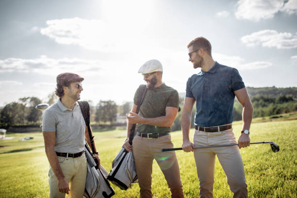 istock Golf player walking and carrying bag on course during summer game golfing 862506546